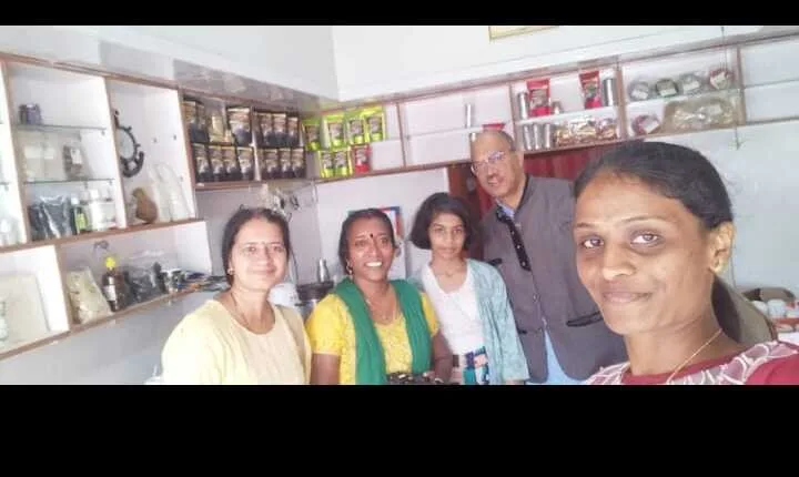 Guests with the Giri Coffee Works family inside the Nazarbad shop